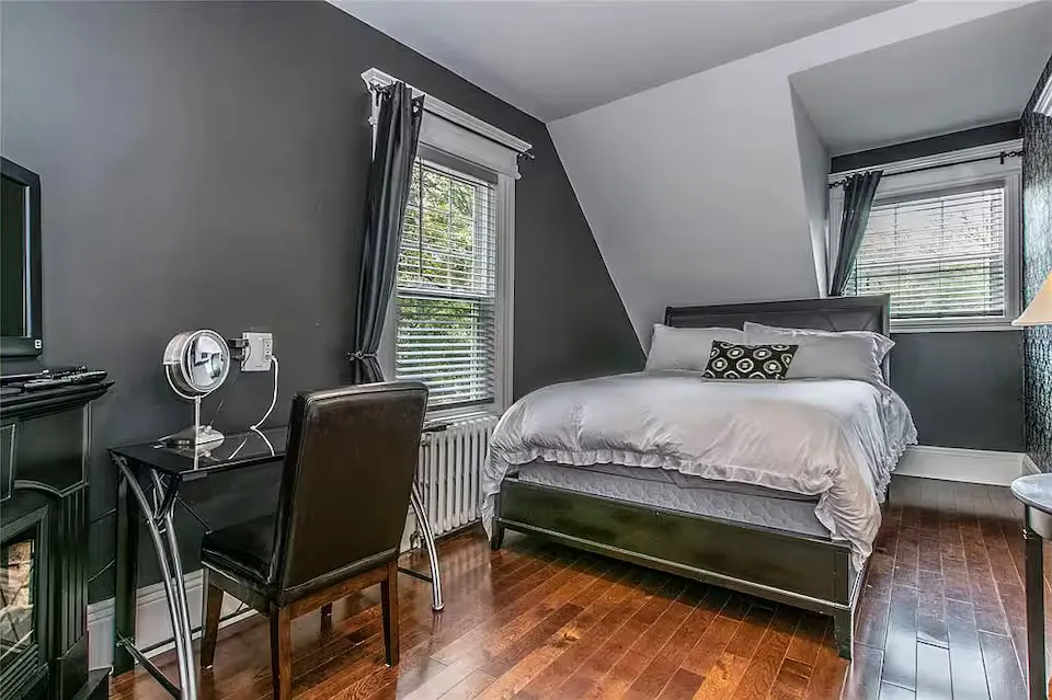 Queen guest bedroom with heritage furnishings